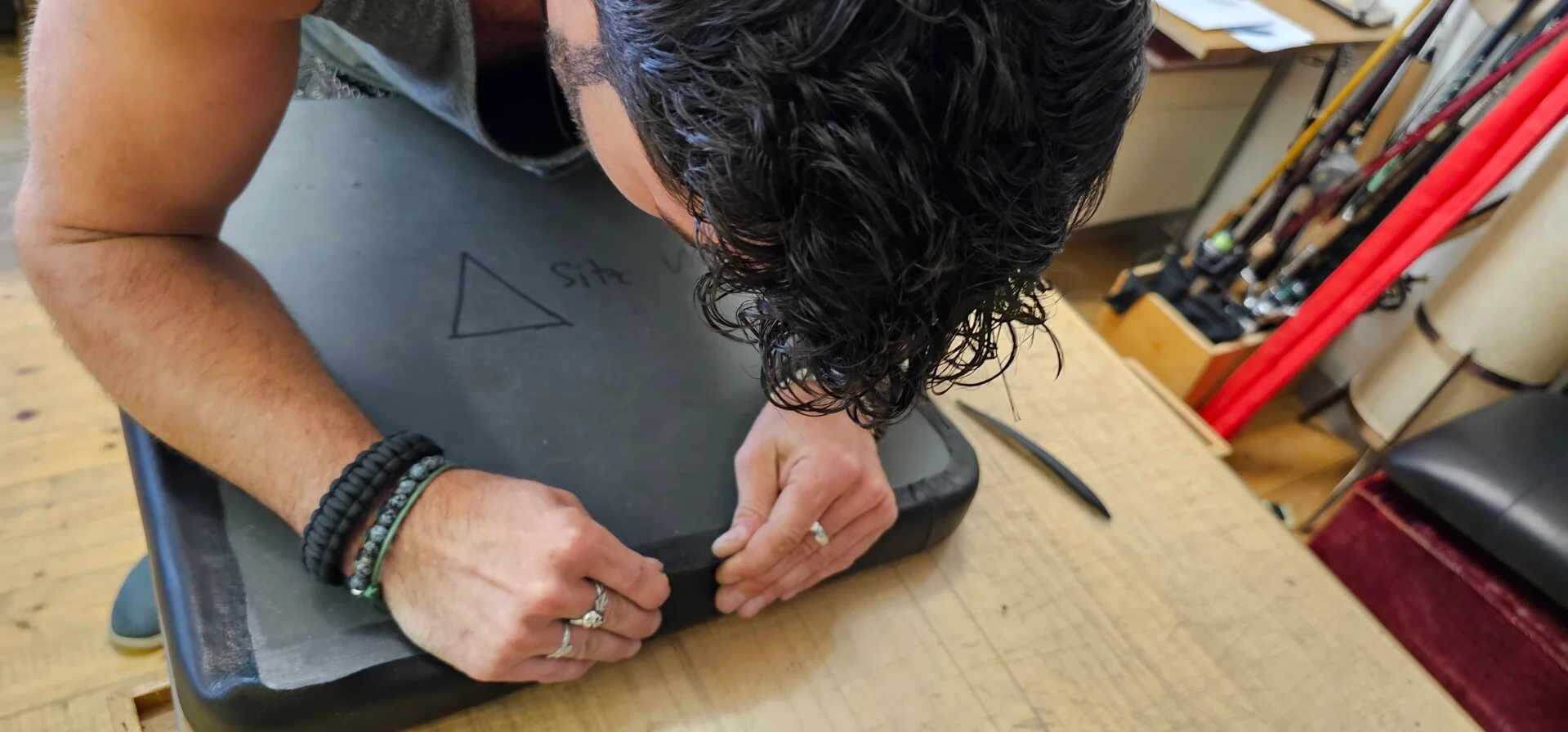 André Läuchli working by hand at a workbench